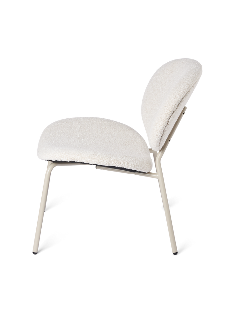 Lounge chair with bouclé fabric