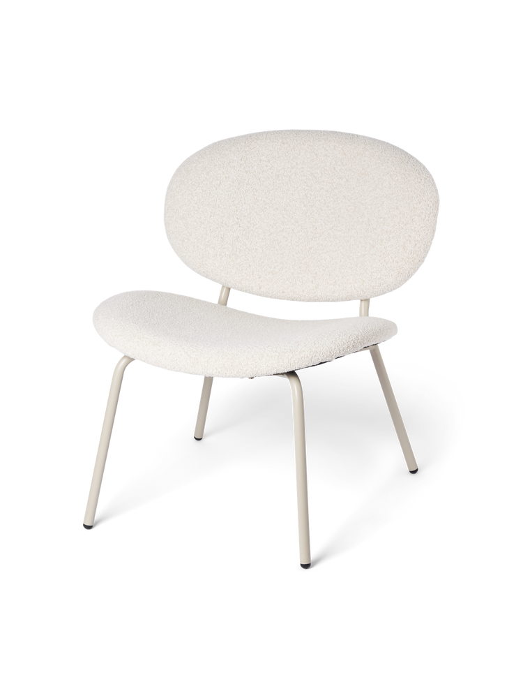 Lounge chair with bouclé fabric