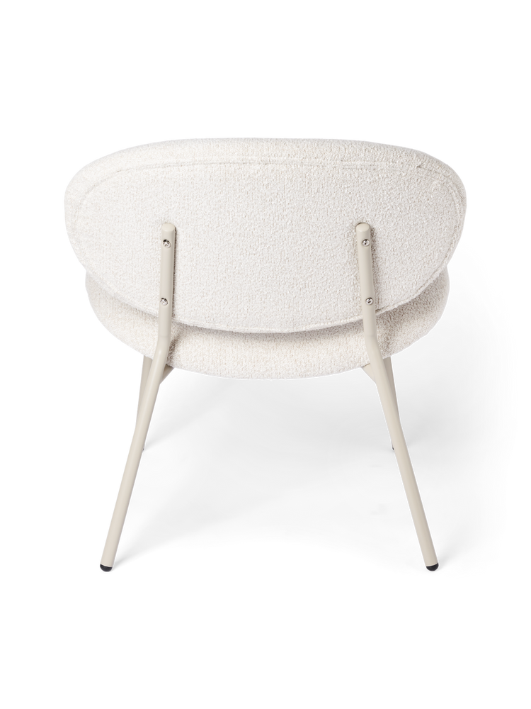 Lounge chair with bouclé fabric