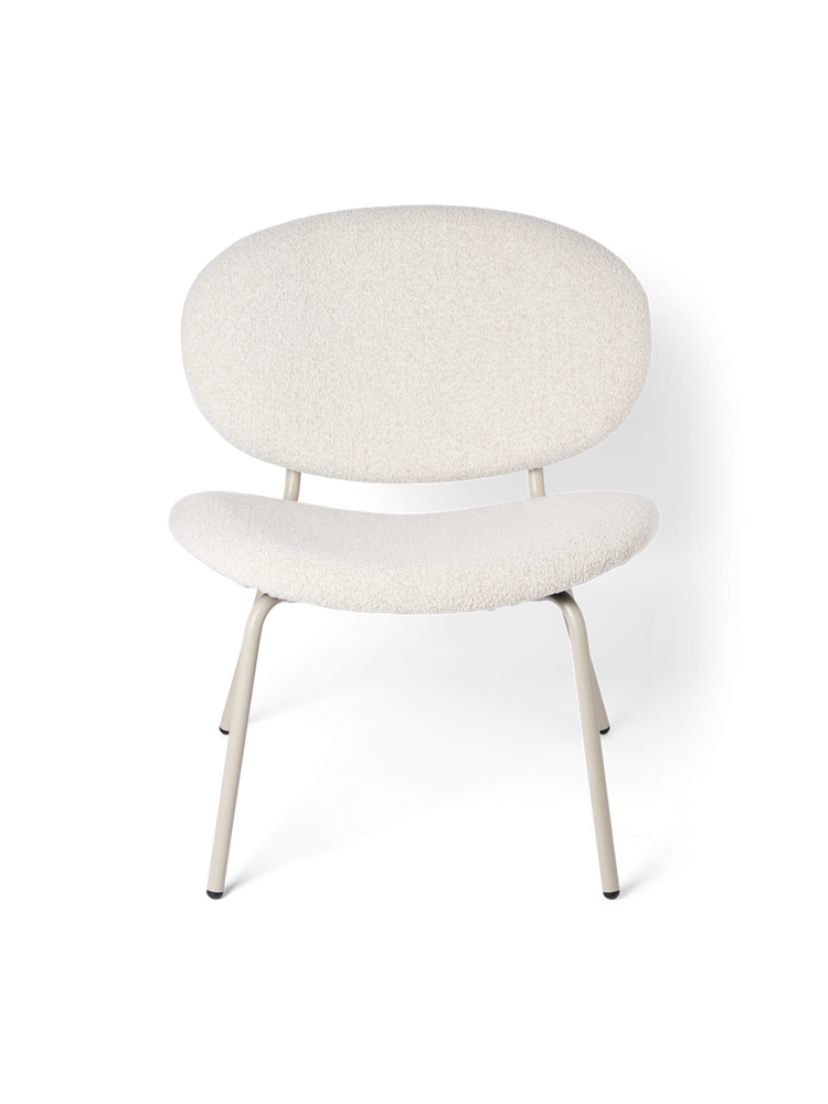 Lounge chair with bouclé fabric