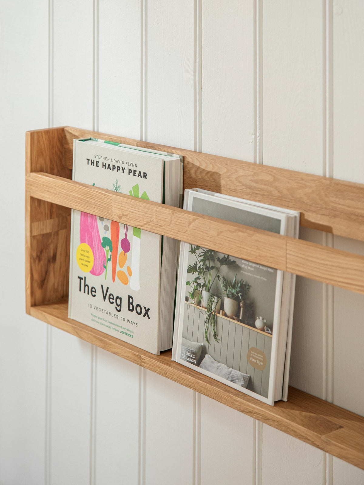 Wall-mounted magazine holder