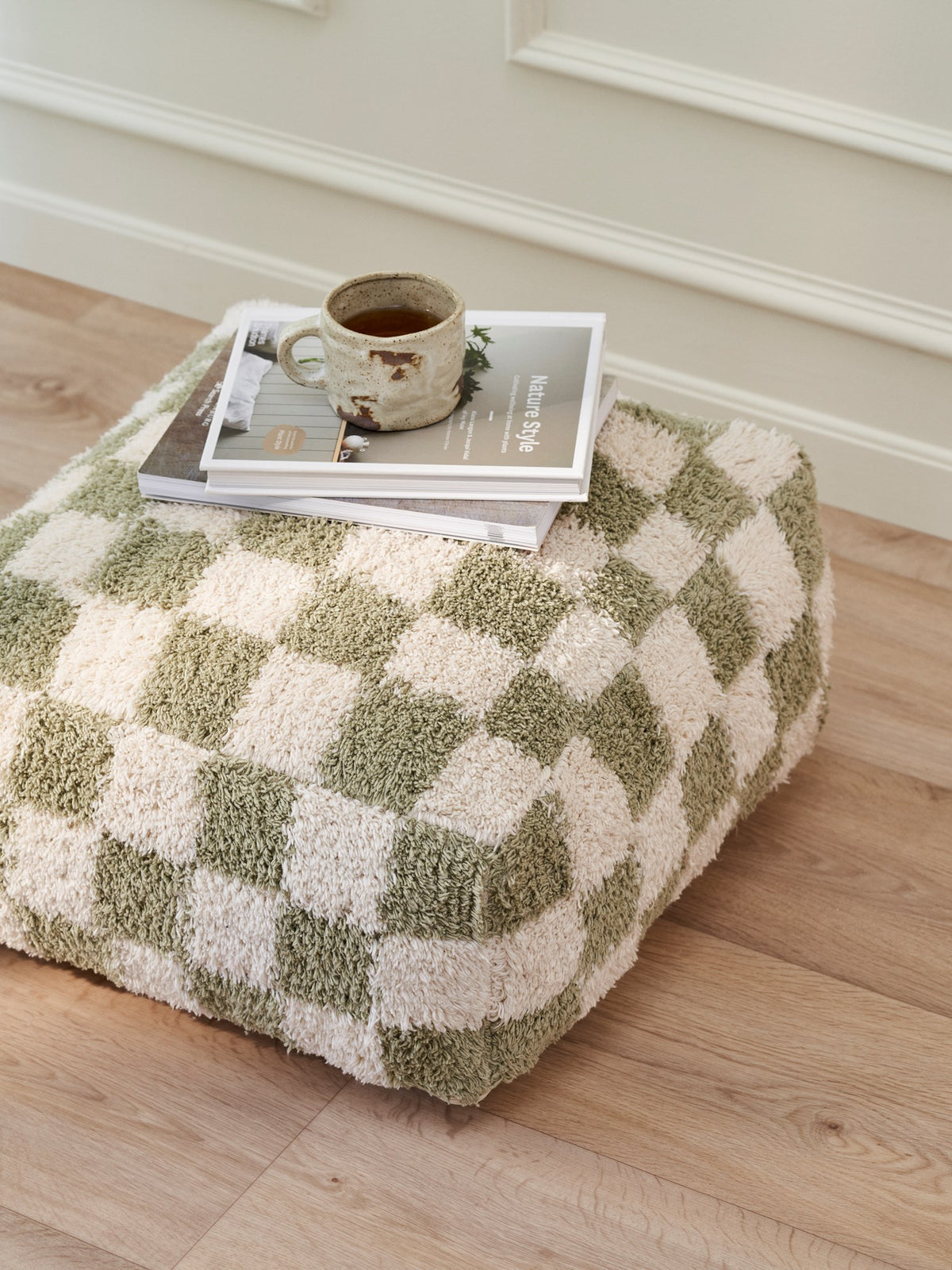 Checkered pouffe
