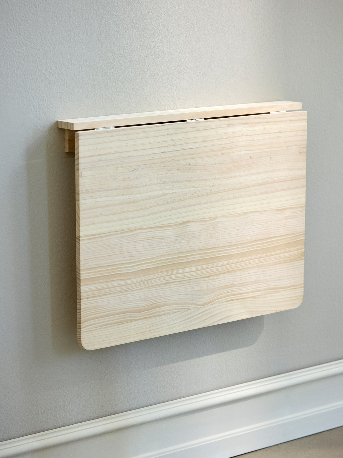 Foldable wall-mounted table