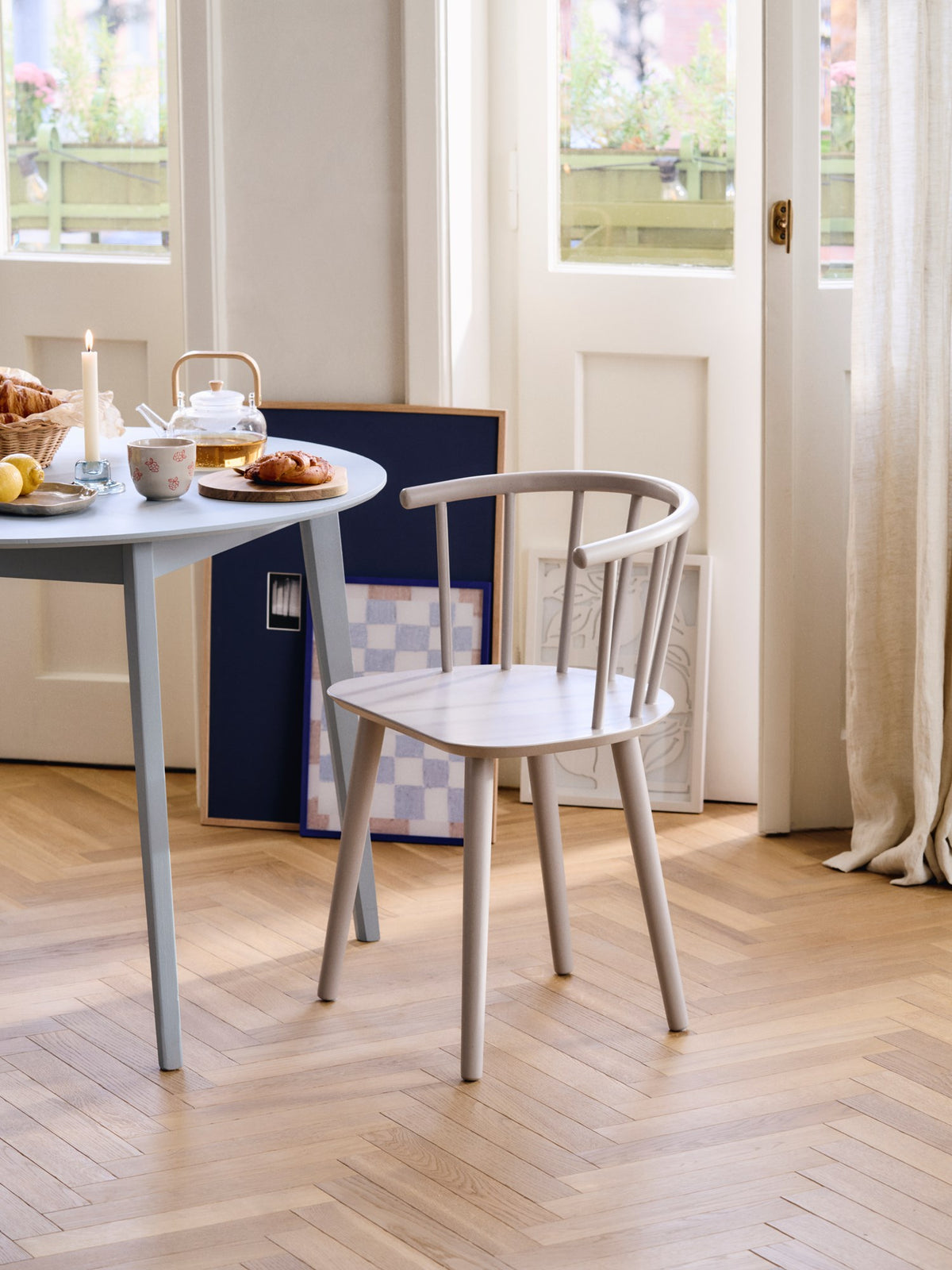 Wooden dining chair with arm rest