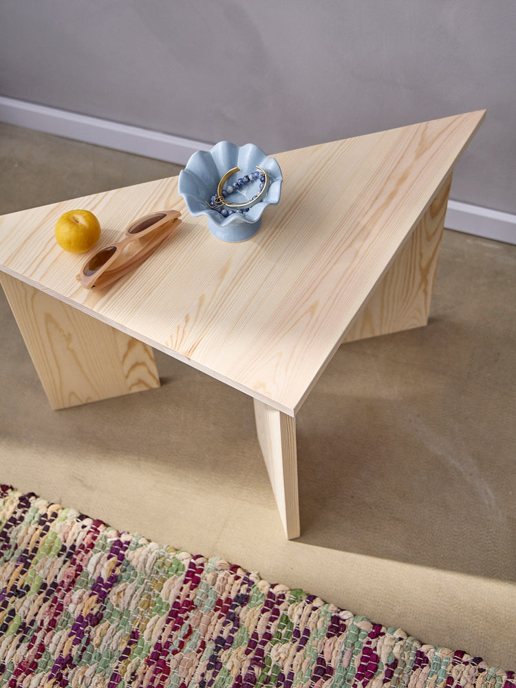 Triangular pinewood side table