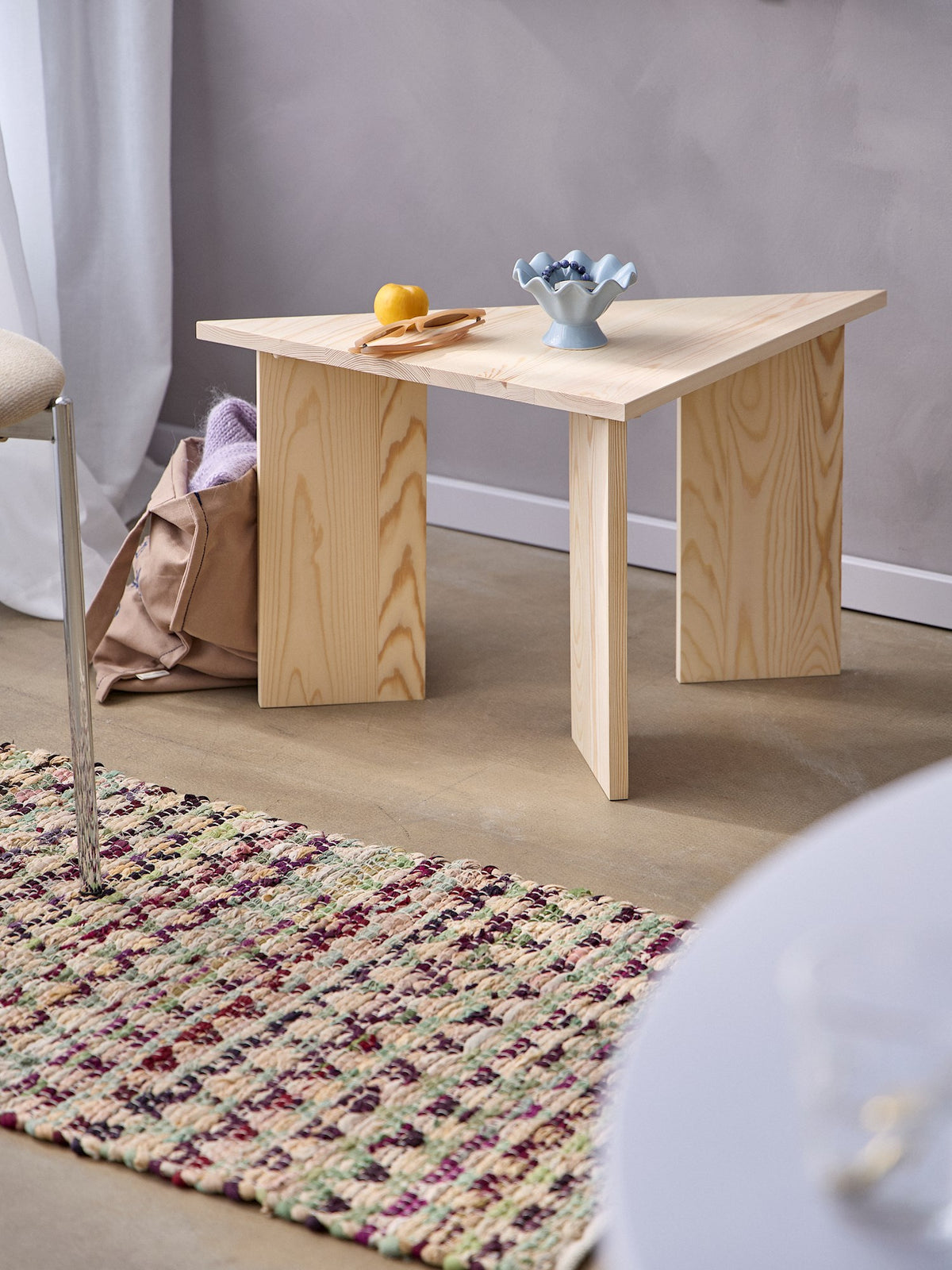 Triangular pinewood side table