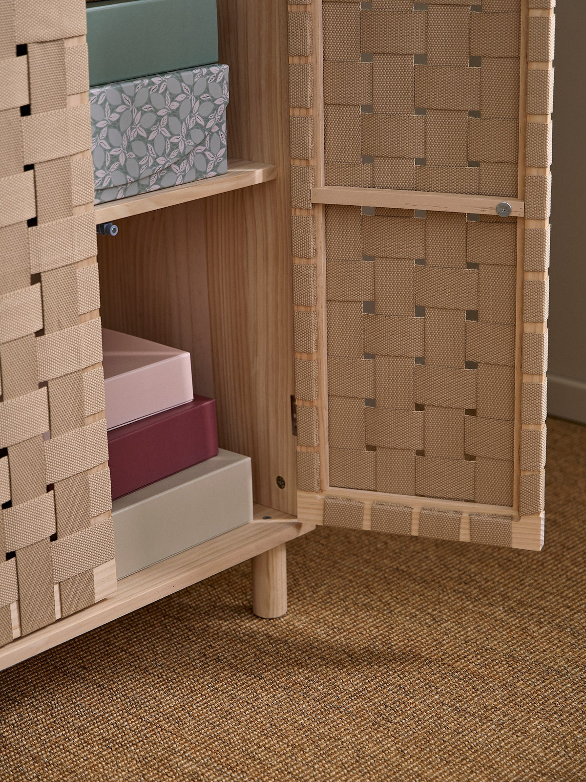 Cabinet with woven design