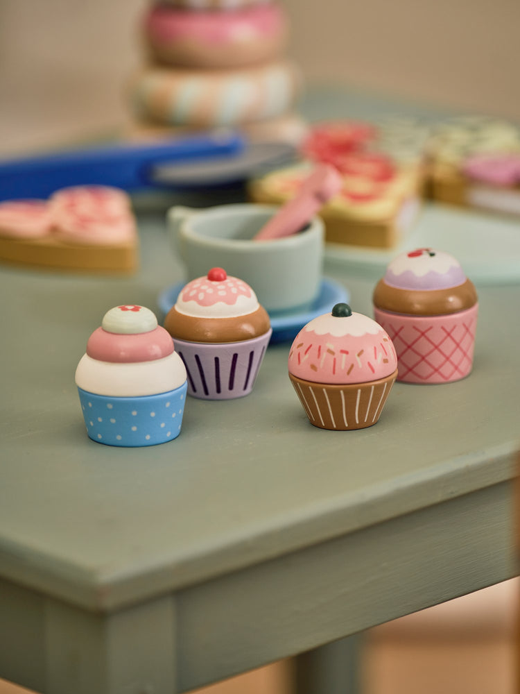 Wooden toy cupcakes