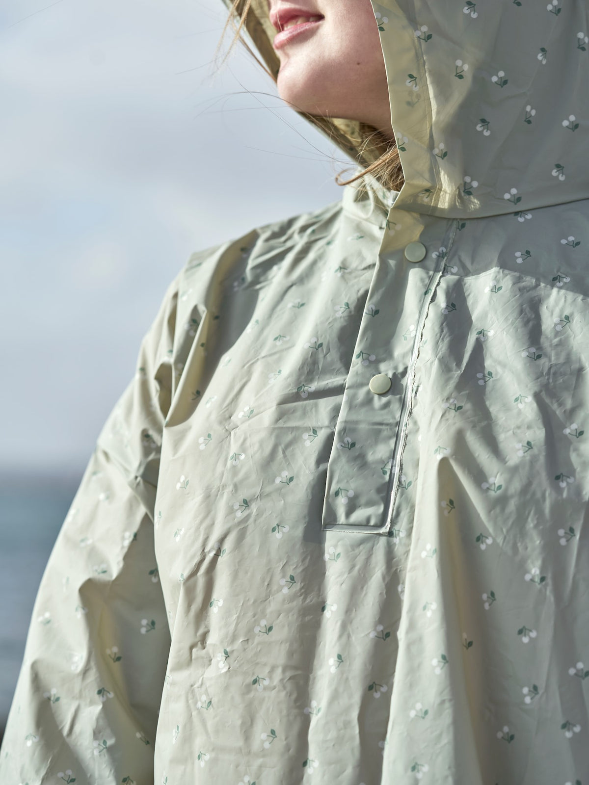 Reusable rain poncho for adults