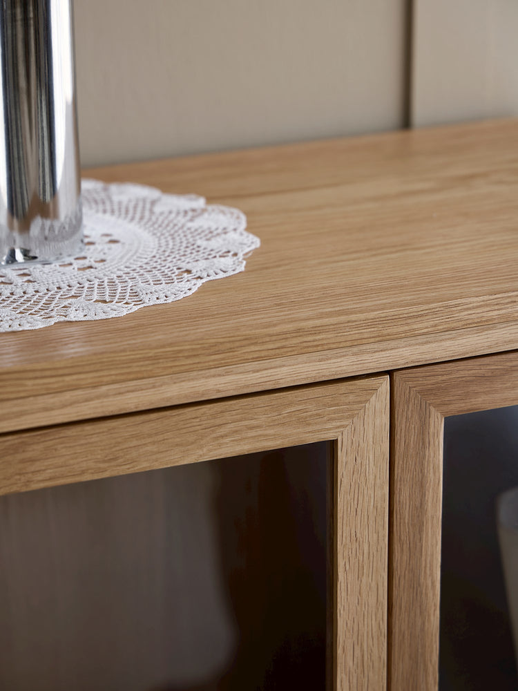 Wooden cabinet with glass doors