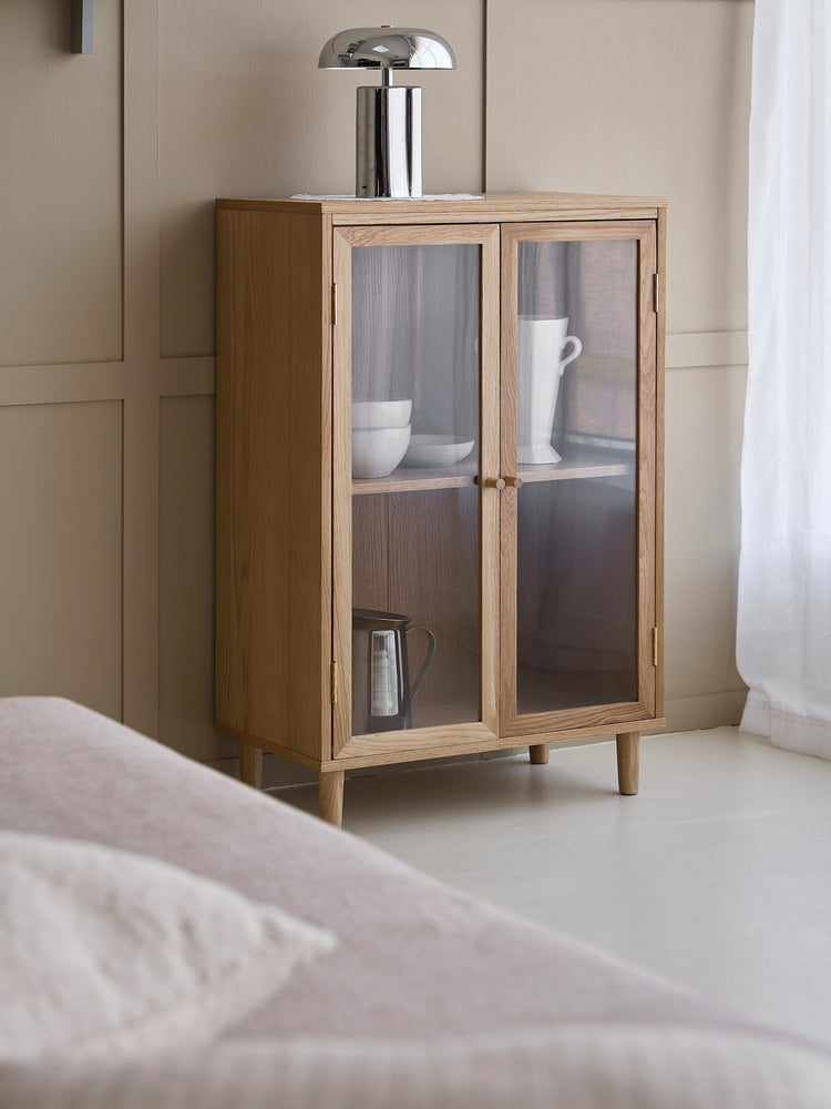 Wooden cabinet with glass doors