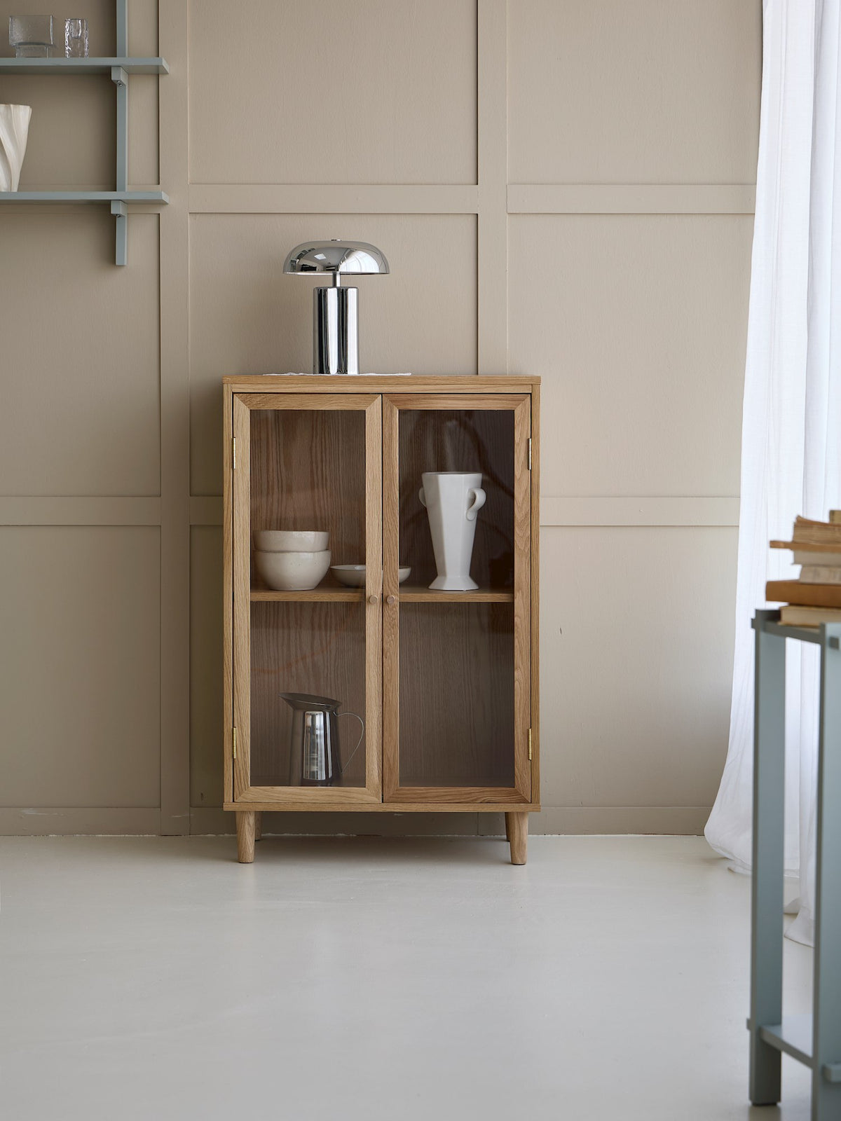Wooden cabinet with glass doors