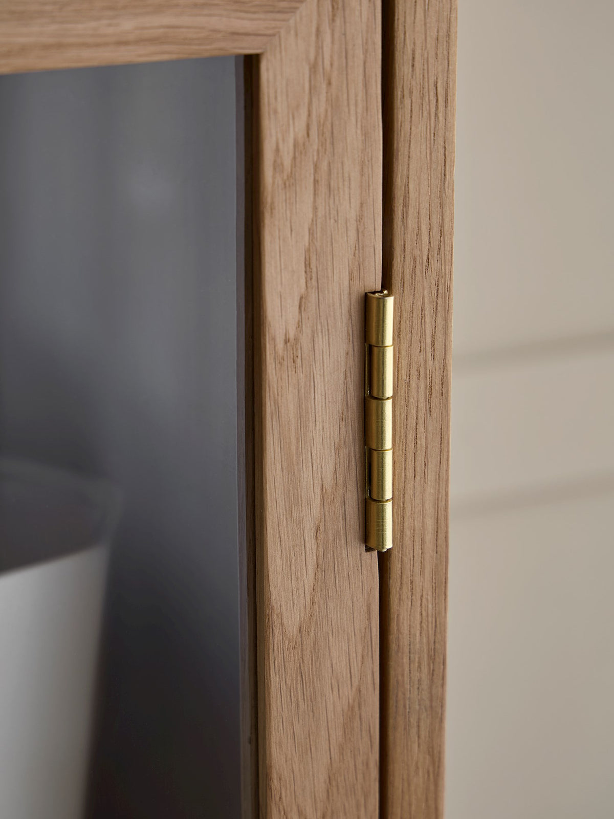 Wooden cabinet with glass doors