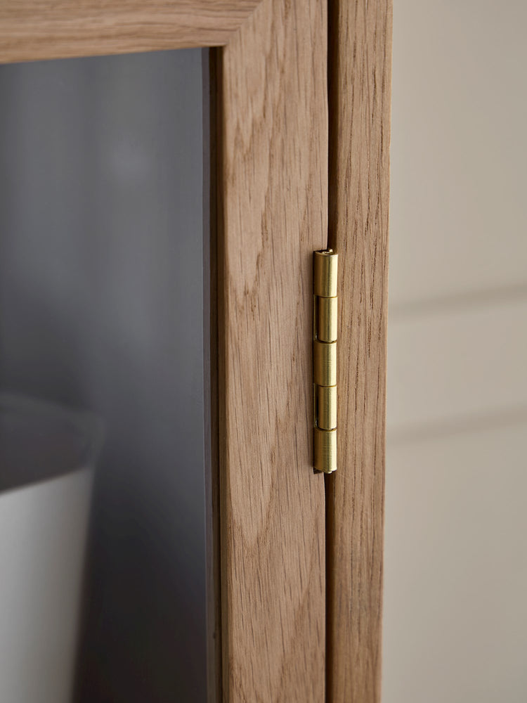Wooden cabinet with glass doors