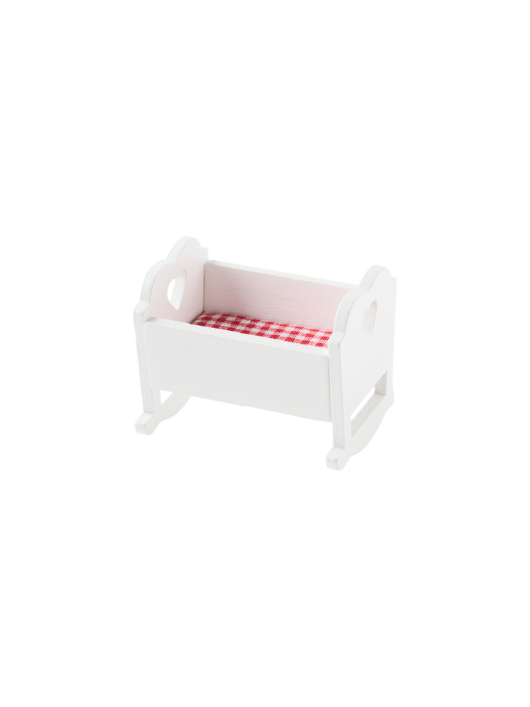 Miniature cradle with blanket