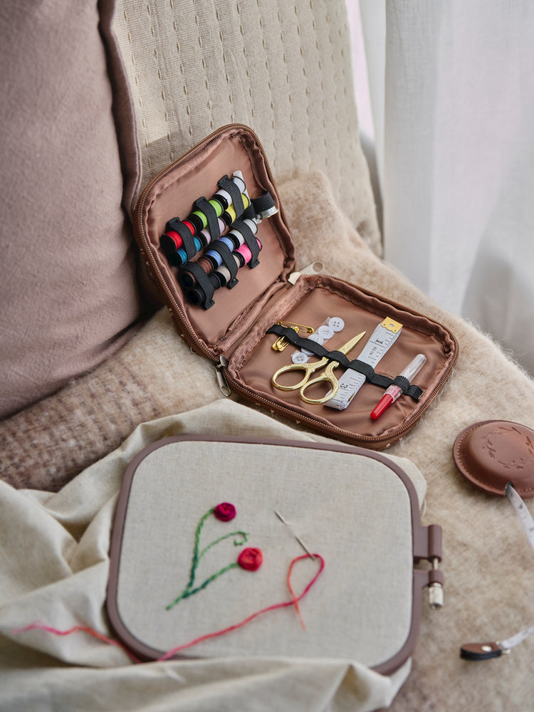 Sewing kit in textile cover