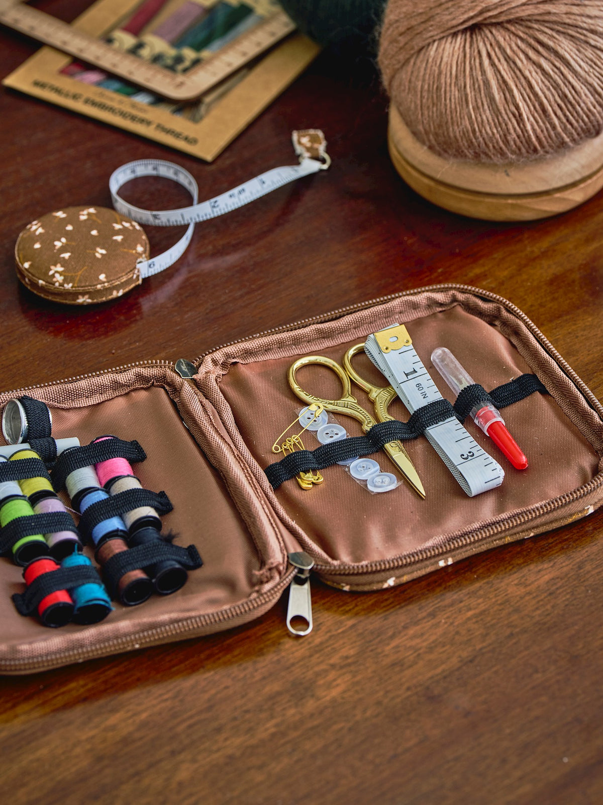 Sewing kit in textile cover