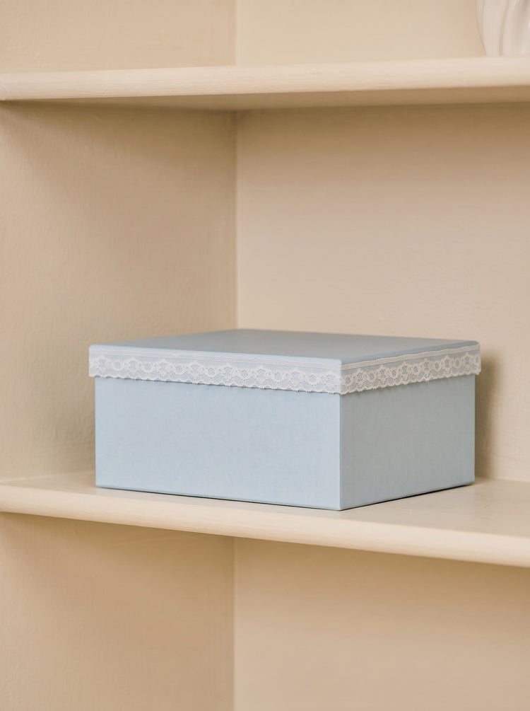Storage box with lace detail