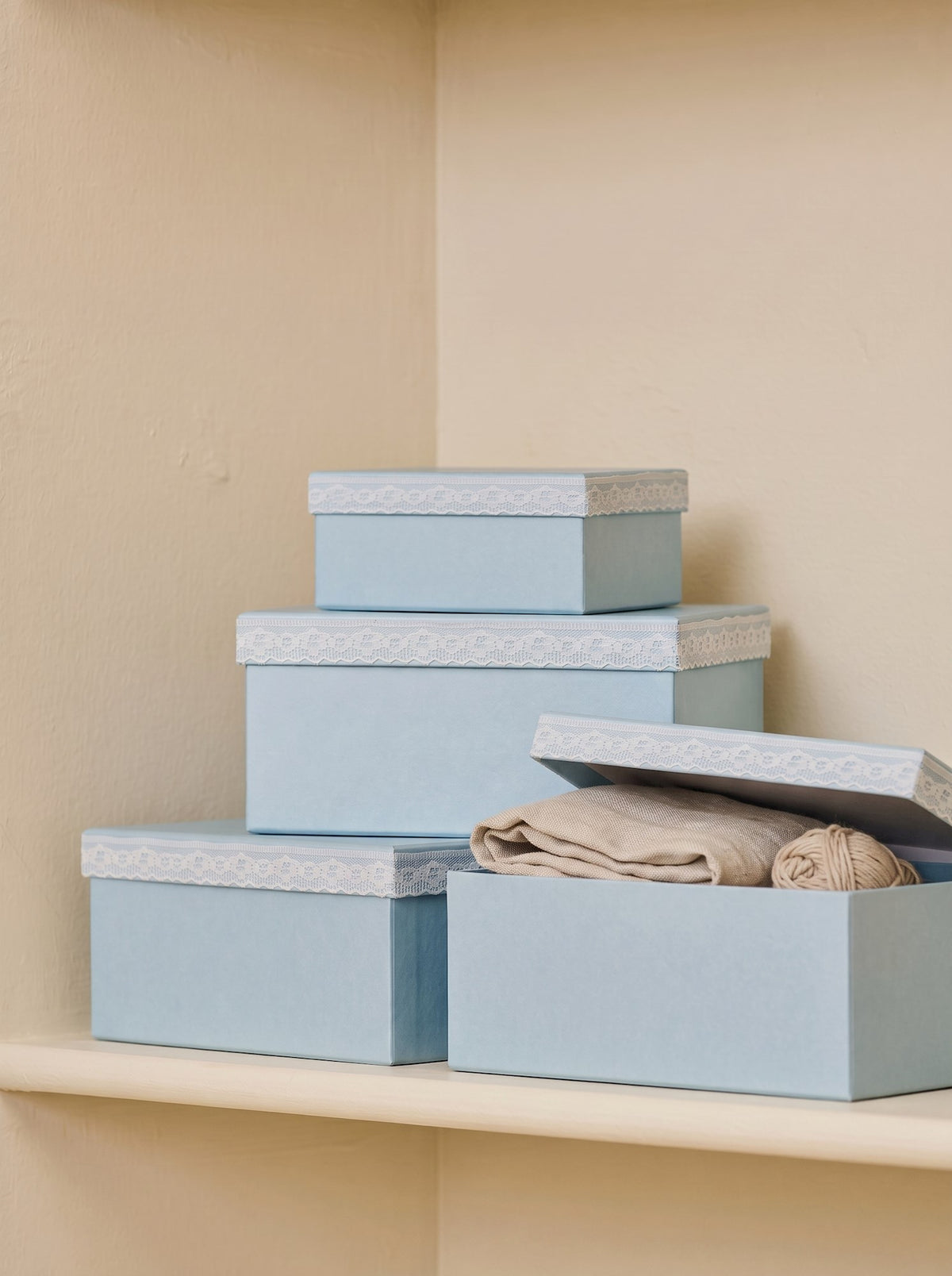 Storage box with lace detail