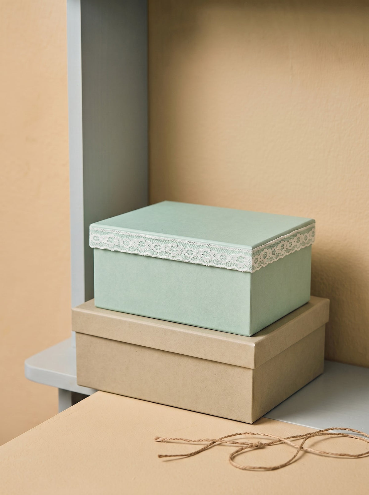 Storage box with lace detail