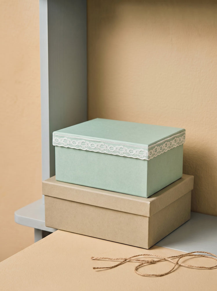 Storage box with lace detail