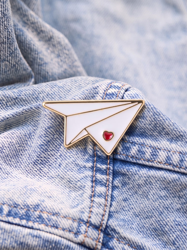 Paper plan enamel pin