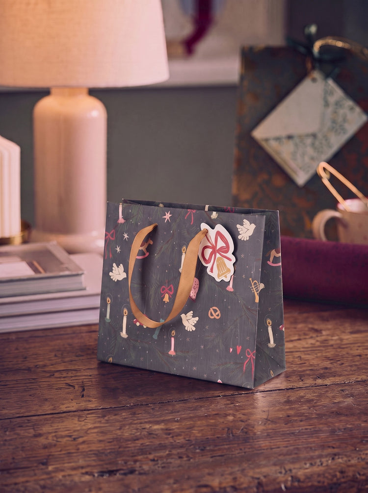 Gift bag with handles and tag