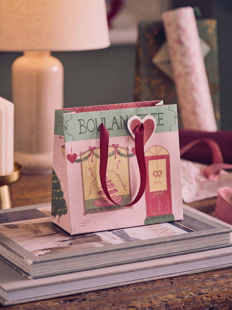 Gift bag with handles and tag