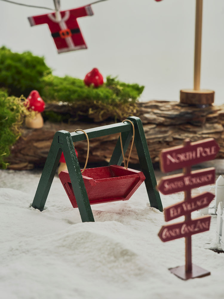Miniature swing