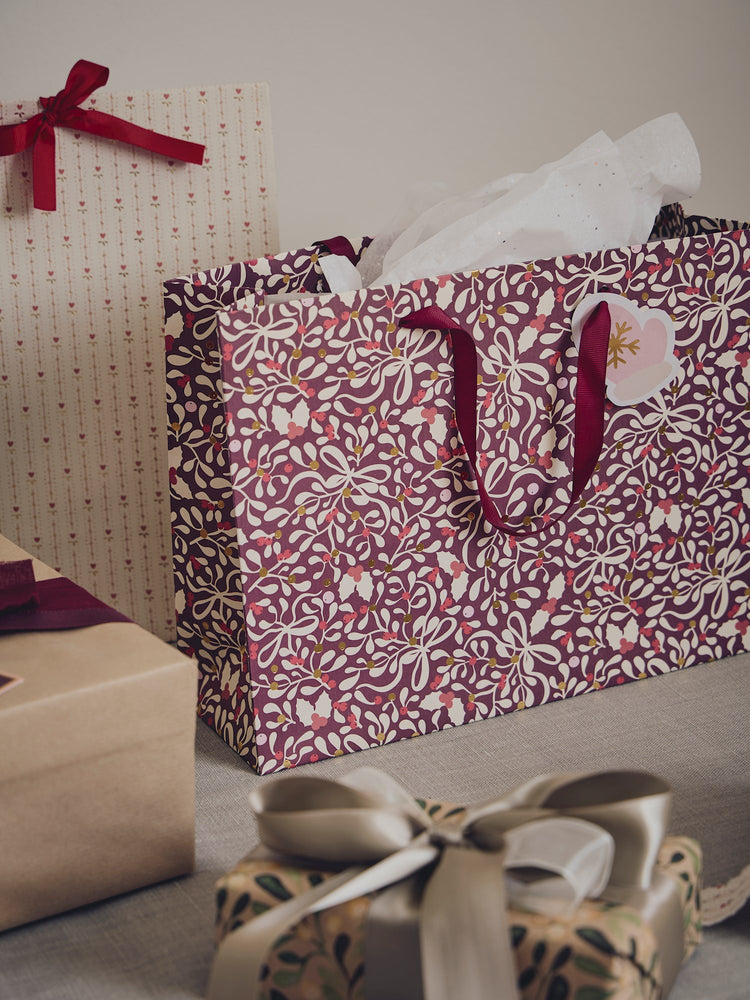 Gift bag with handles and tag