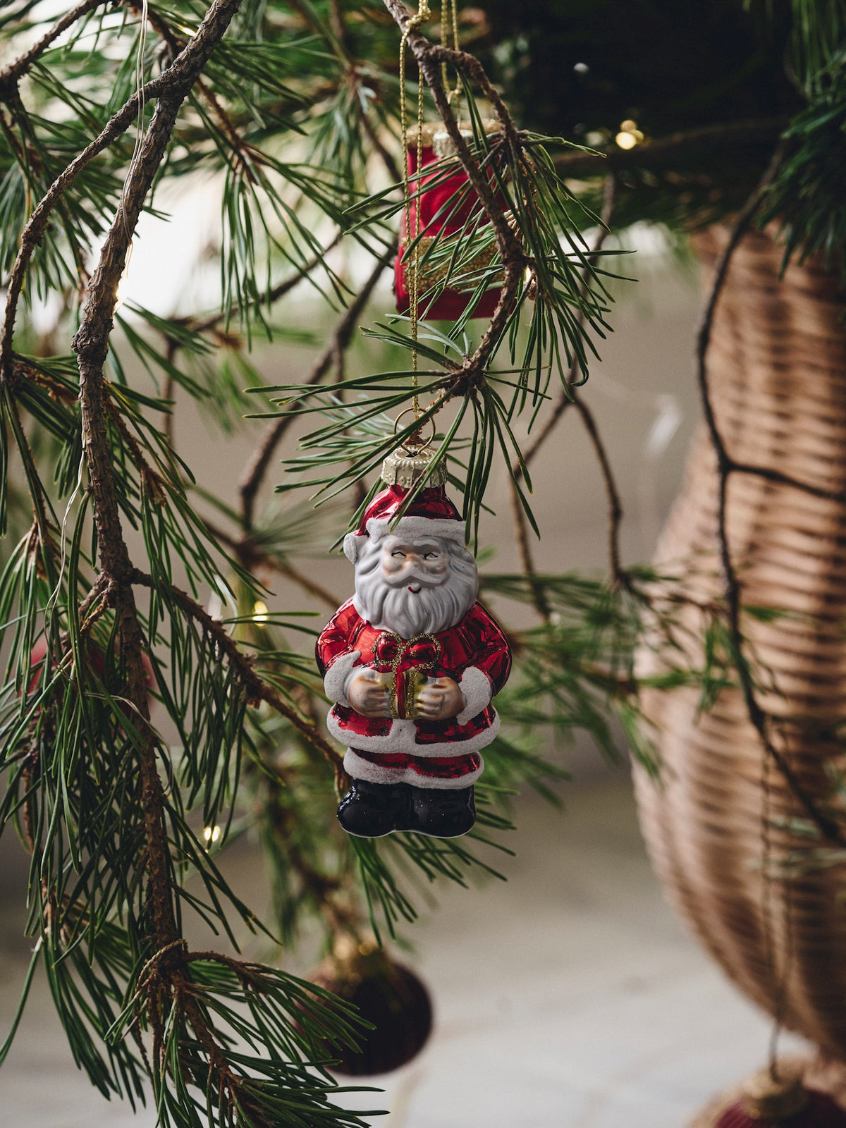 Christmas ornament Santa with gift