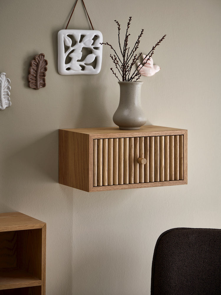 Floating shelf with drawer
