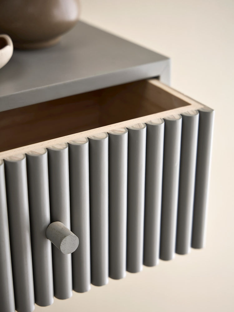 Floating shelf with drawer
