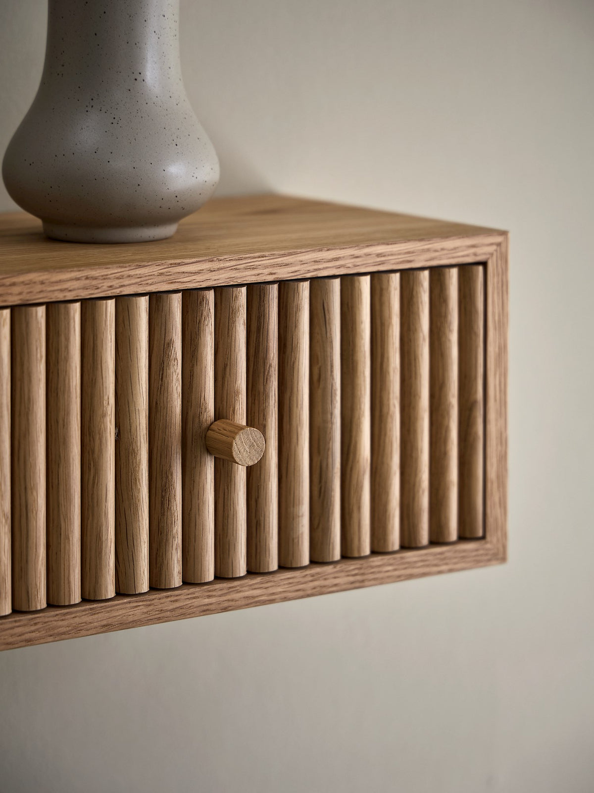 Floating shelf with drawer