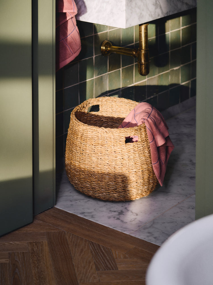 Woven basket with handles
